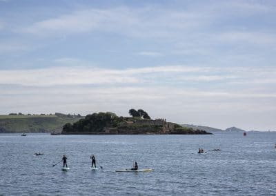 People on surfboards near Plymouth